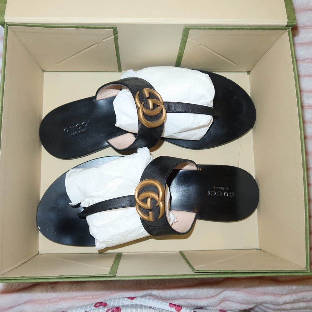 Gucci Black Slides with Gold Logo